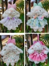 A cute and diverse schoolbag pendant in the shape of a plush rabbit with a drawstring skirt and hanging ears Application Scenario